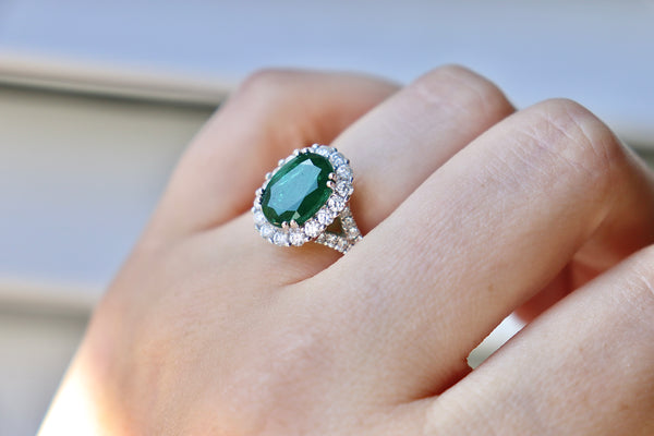 18ct White Gold Emerald and Diamond Halo Ring