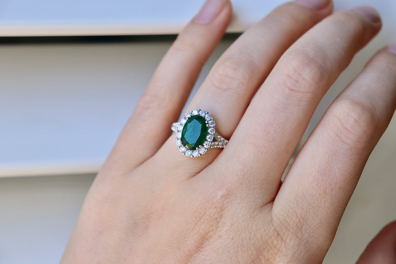 18ct White Gold Emerald and Diamond Halo Ring