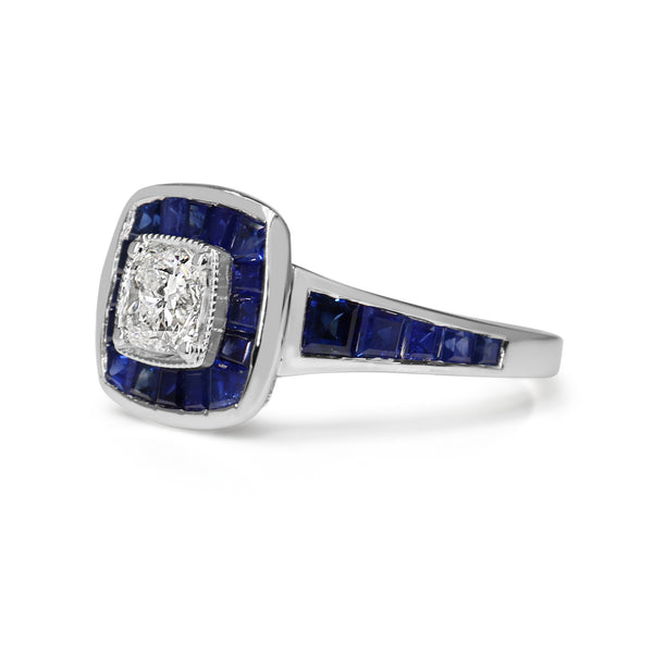 18ct White Gold Cushion Cut Diamond and Channel Set Sapphire Halo Ring