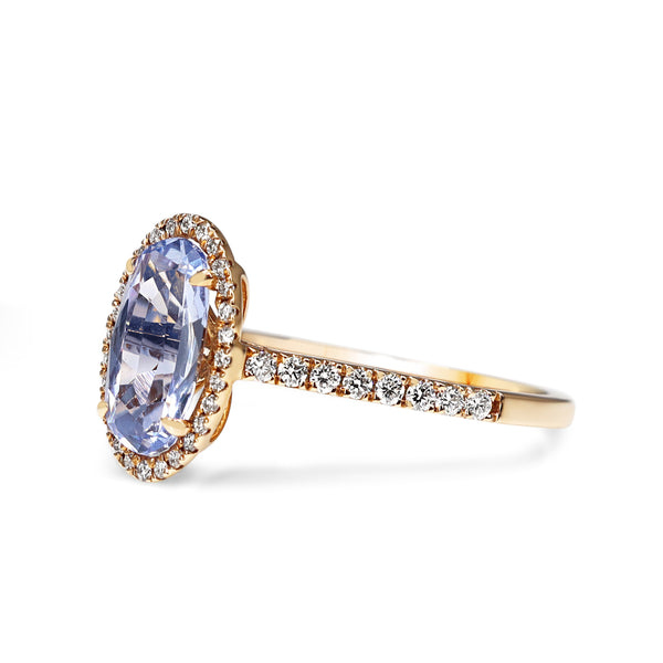 18ct Rose Gold Oval Sapphire and Diamond Halo Ring