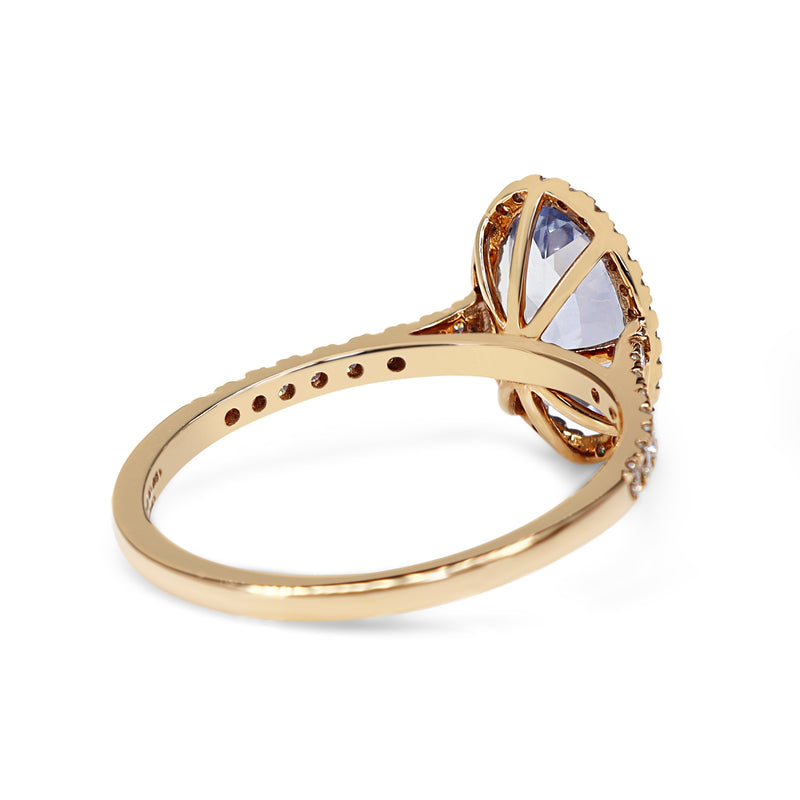 18ct Rose Gold Oval Sapphire and Diamond Halo Ring