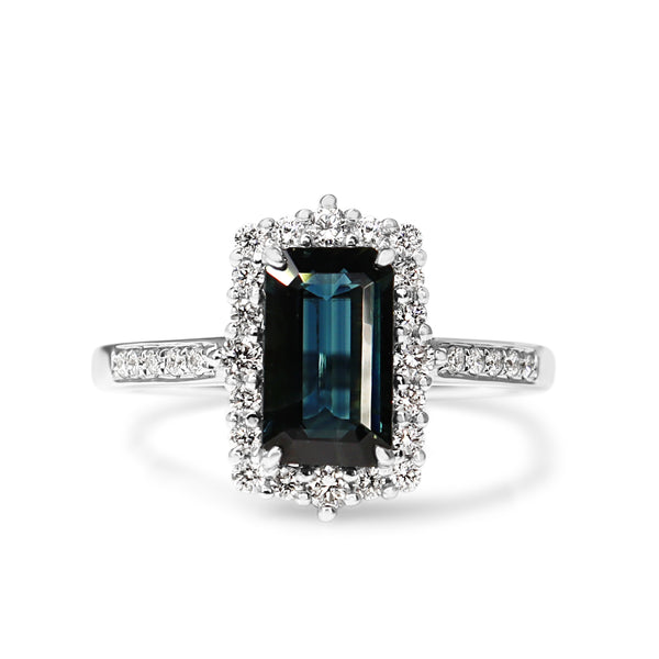 18ct White Gold Emerald Cut Sapphire and Diamond Halo Ring