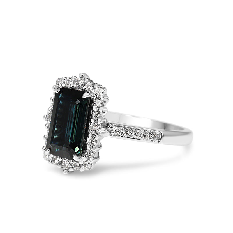 18ct White Gold Emerald Cut Sapphire and Diamond Halo Ring