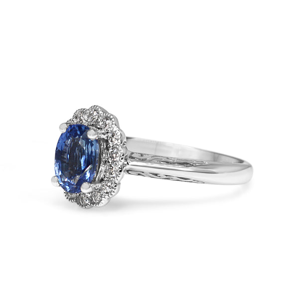 9ct White Gold Tanzanite and Diamond Daisy Halo Style Ring