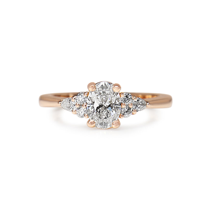 18ct Rose Gold Oval, Round and Pear Cut Diamond Ring