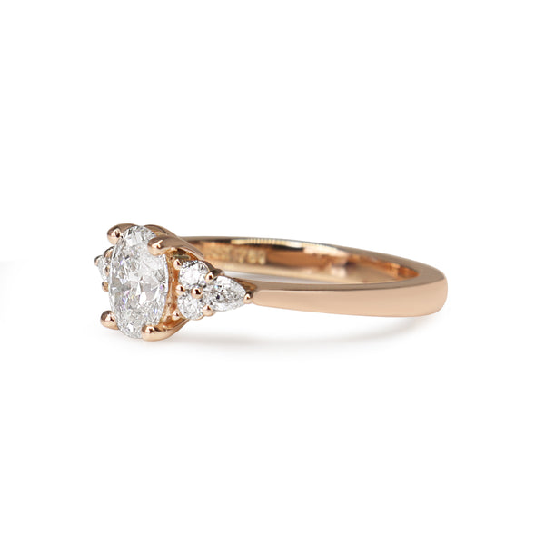 18ct Rose Gold Oval, Round and Pear Cut Diamond Ring