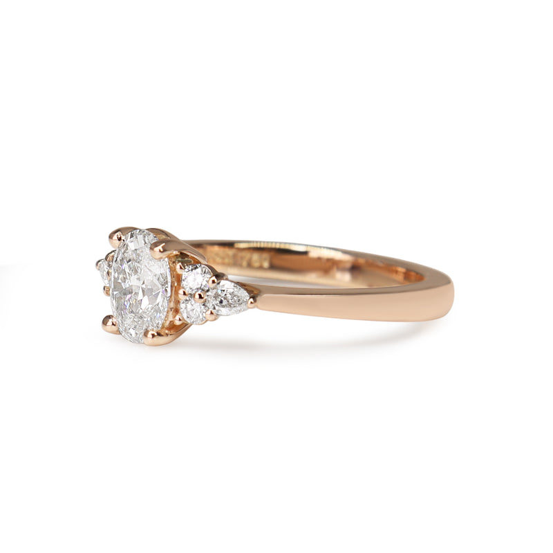18ct Rose Gold Oval, Round and Pear Cut Diamond Ring