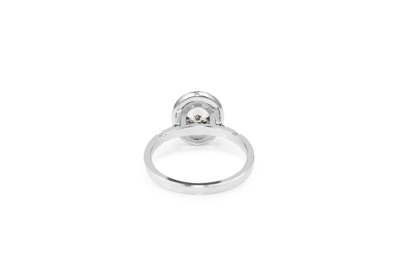 18ct White Gold Oval Diamond Halo Ring