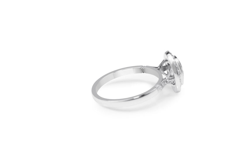 18ct White Gold Oval Diamond Halo Ring
