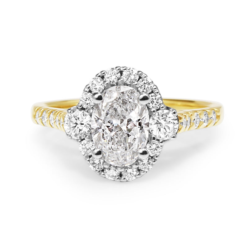 18ct Yellow and White Gold Oval Halo Diamond Ring