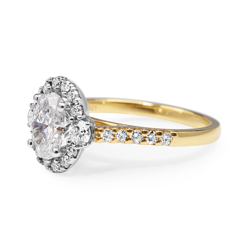 18ct Yellow and White Gold Oval Halo Diamond Ring