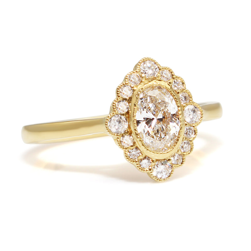 18ct Yellow Gold Oval Halo Diamond Ring