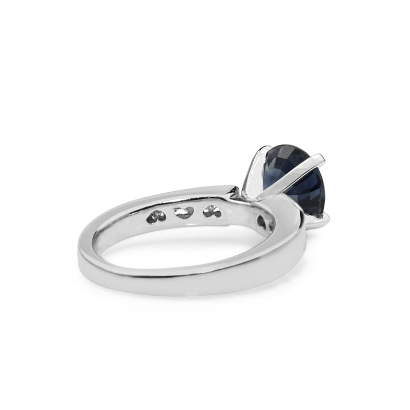 Platinum Sapphire and Diamond Solitaire Ring