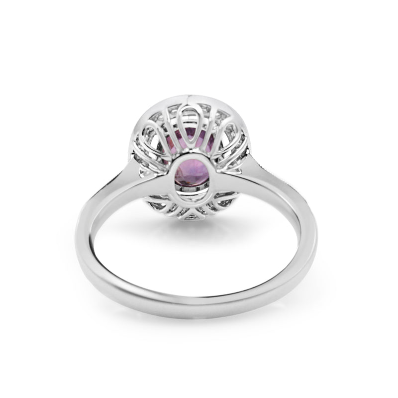 18ct White Gold Pink / Purple Sapphire and Diamond Halo Ring