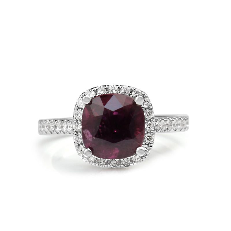 18ct White Gold Pink Sapphire and Diamond Halo Ring