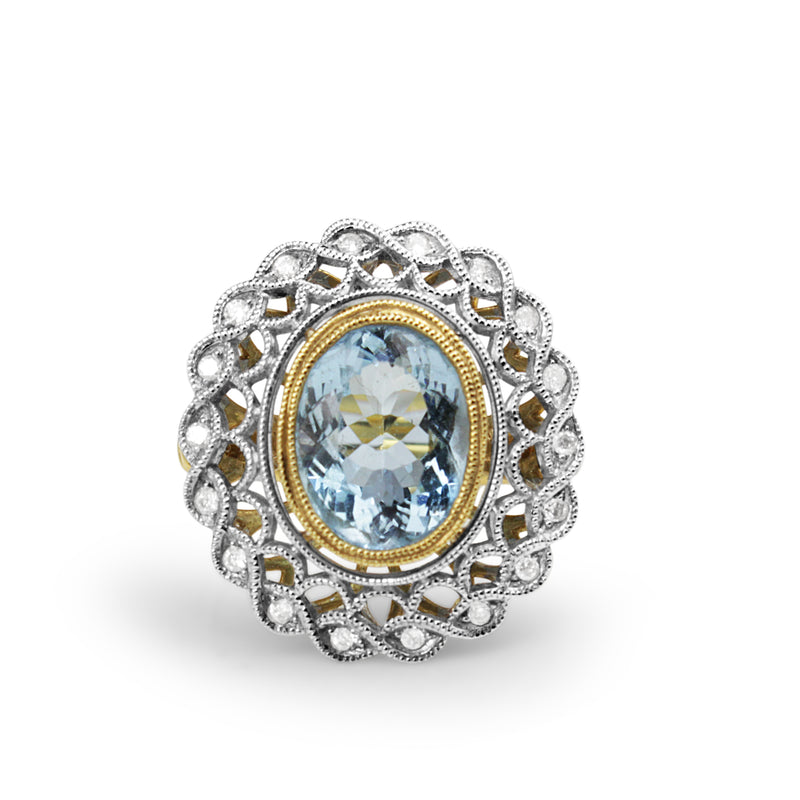 18ct Yellow and White Gold Aquamarine and Diamond Halo Ring