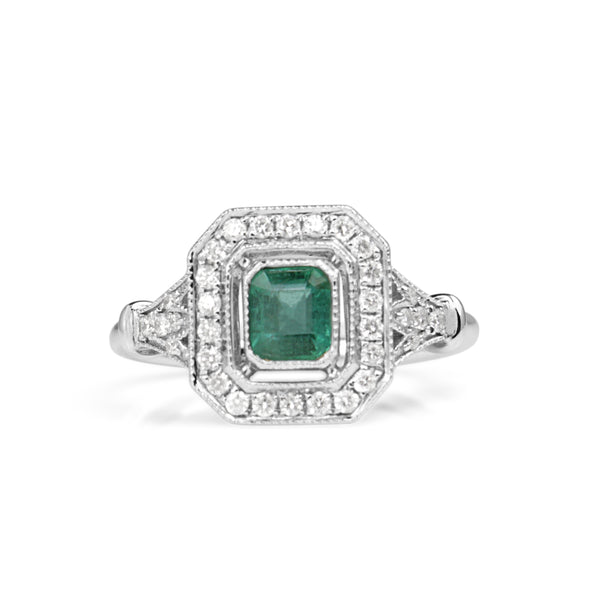 18ct White Gold Emerald and Diamond Halo Ring