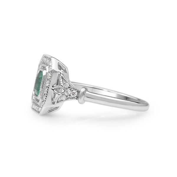 18ct White Gold Emerald and Diamond Halo Ring