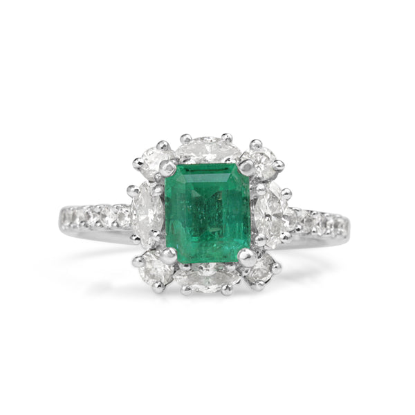 18ct White Gold Emerald and Diamond Halo Ring