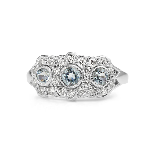 9ct White Gold Topaz and Diamond Floral Halo Ring