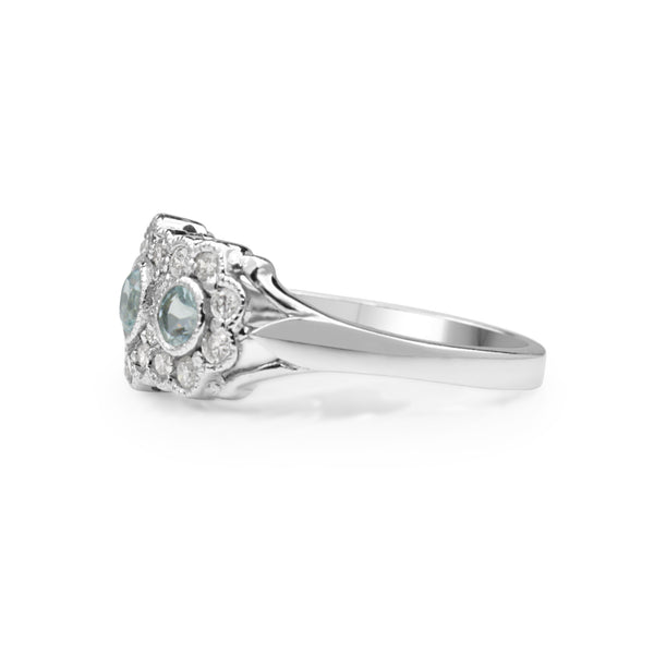 9ct White Gold Topaz and Diamond Floral Halo Ring
