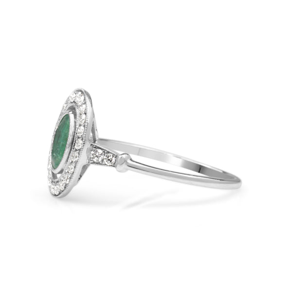 18ct White Gold Emerald and Diamond Halo Ring