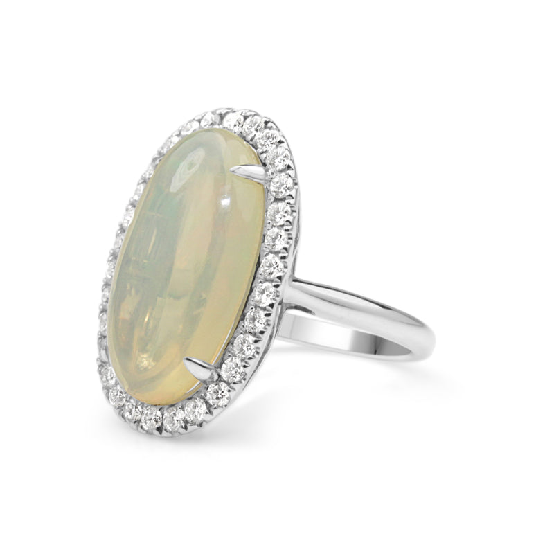 14ct White Gold Opal and Diamond Halo Ring