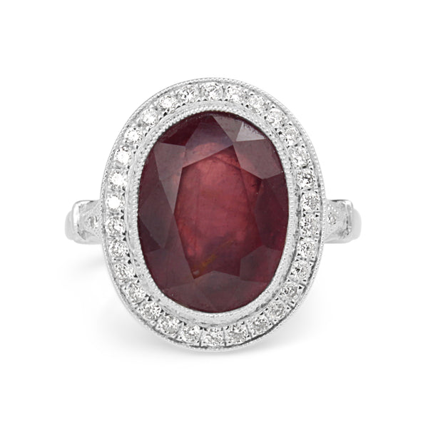 18ct White Gold Treated Ruby and Diamond Halo Ring