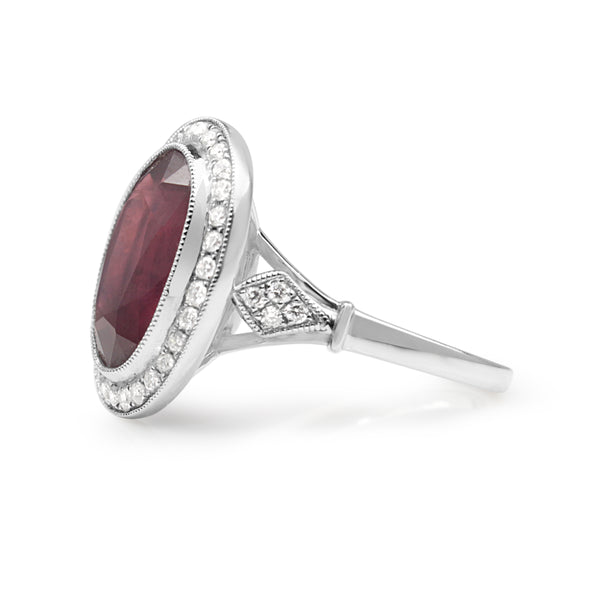 18ct White Gold Treated Ruby and Diamond Halo Ring