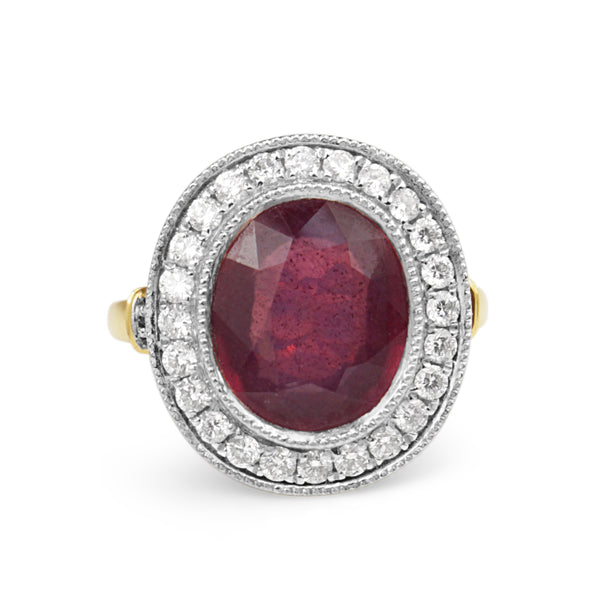 18ct Yellow and White Gold Treated Ruby and Diamond Halo Ring