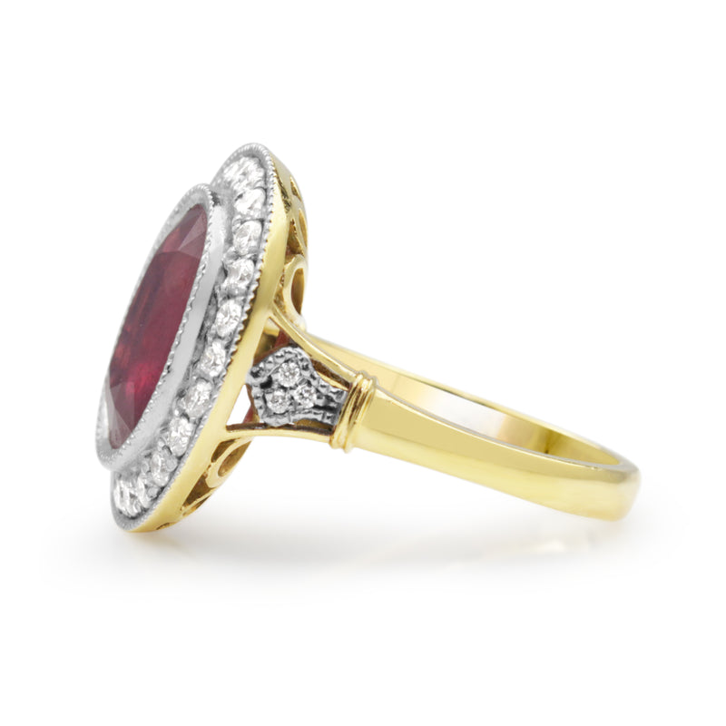 18ct Yellow and White Gold Treated Ruby and Diamond Halo Ring