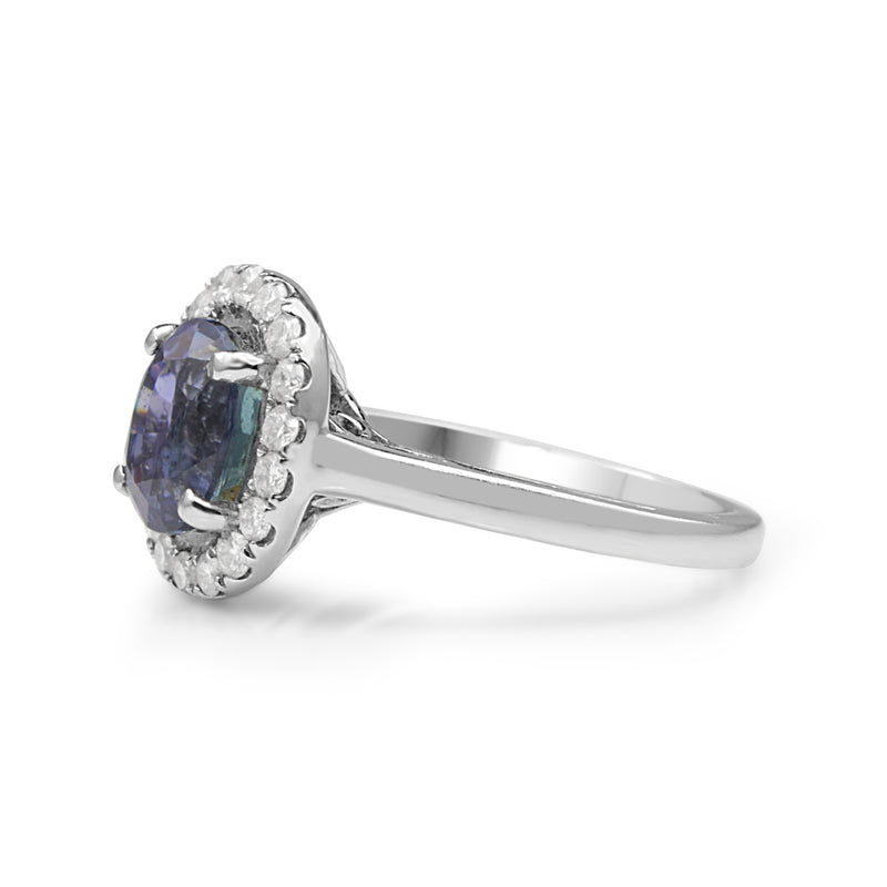 18ct White Gold Tanzanite and Diamond Halo Ring