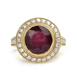 18ct Yellow Gold Treated Ruby and Diamond Halo Ring