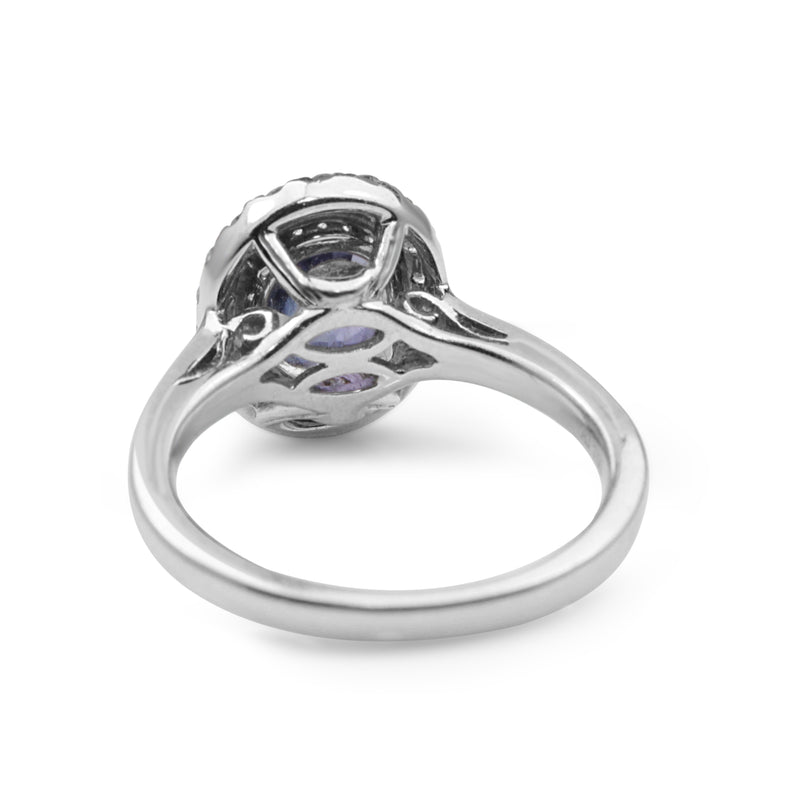 18ct White Gold Tanzanite and Diamond Halo Ring