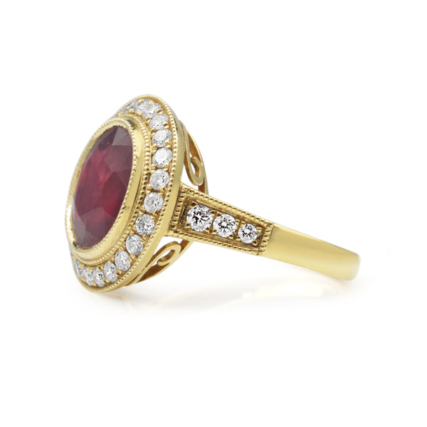 18ct Yellow Gold Treated Ruby and Diamond Halo Ring