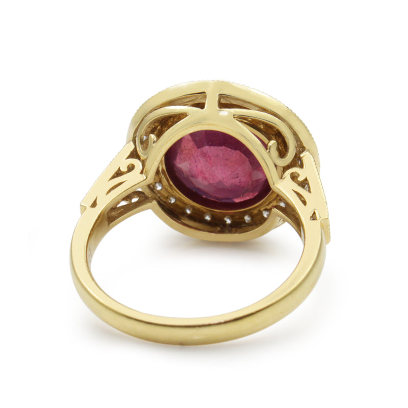 18ct Yellow Gold Treated Ruby and Diamond Halo Ring