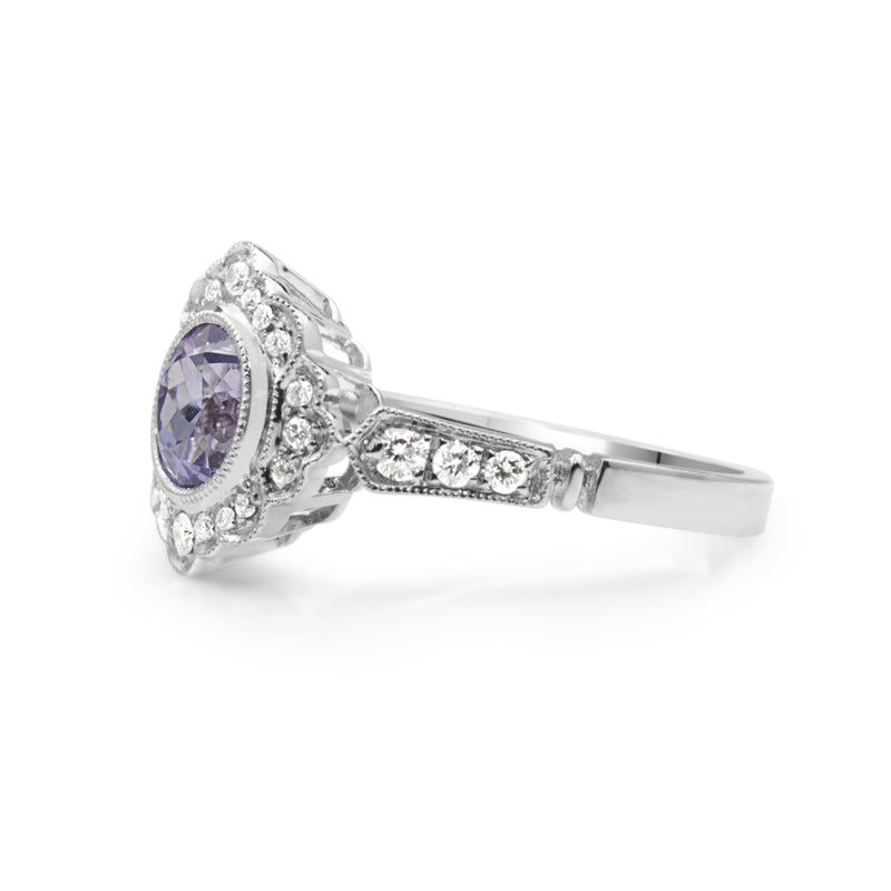 18ct White Gold Tanzanite and Diamond Daisy Style Ring