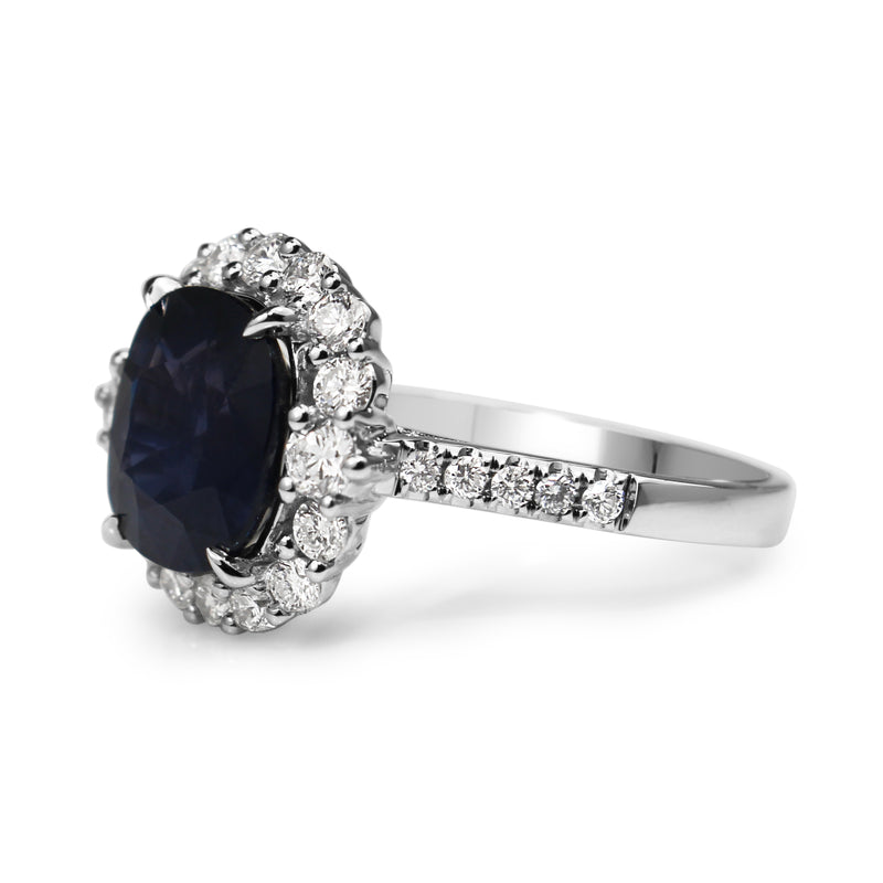 18ct White Gold Cushion Sapphire and Diamond Halo Ring