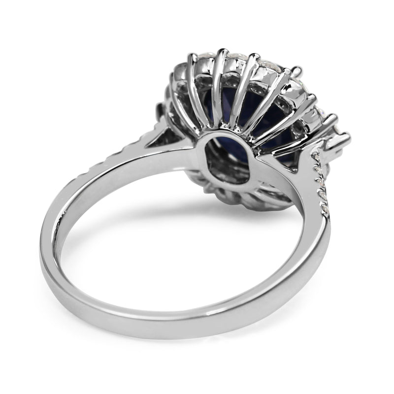 18ct White Gold Cushion Sapphire and Diamond Halo Ring