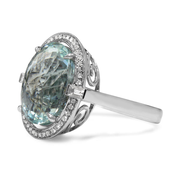 18ct White Gold Aquamarine and Diamond Halo Ring