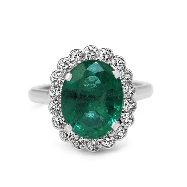 18ct White Gold Emerald and Diamond Daisy Style Ring