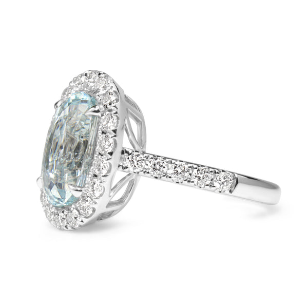 18ct White Gold Aquamarine and Diamond Halo Ring