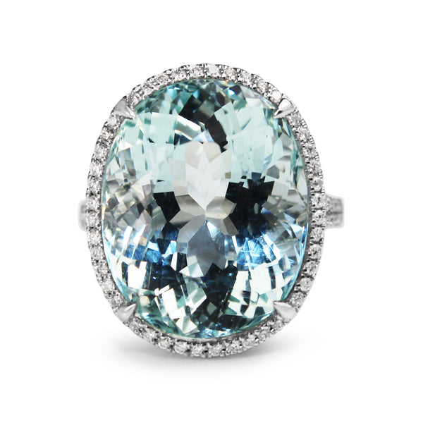 18ct White Gold Aquamarine and Diamond Halo Ring