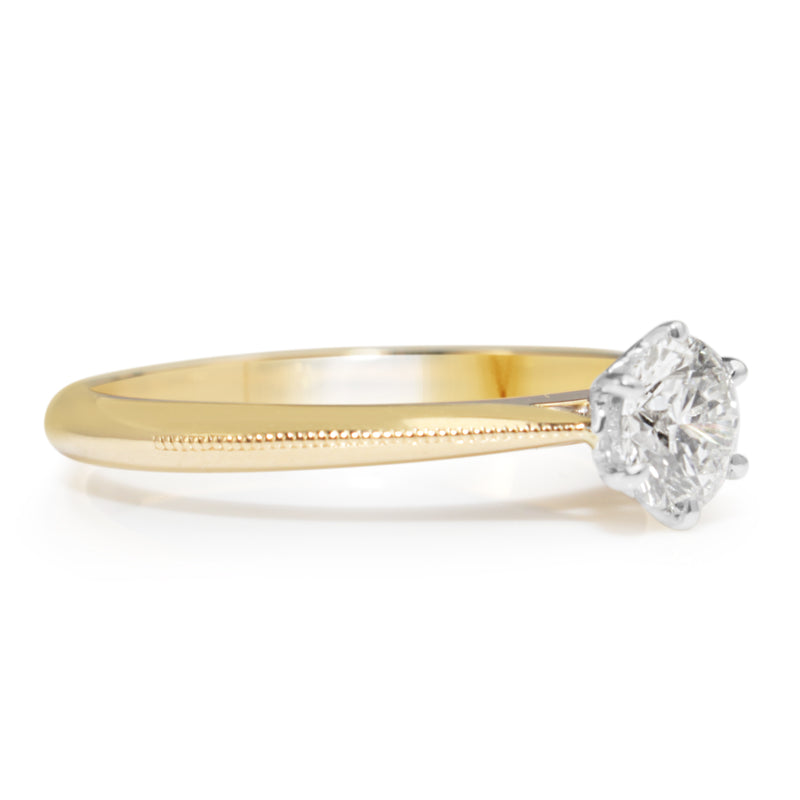 18ct Yellow and White Gold .50ct Diamond Solitaire ring