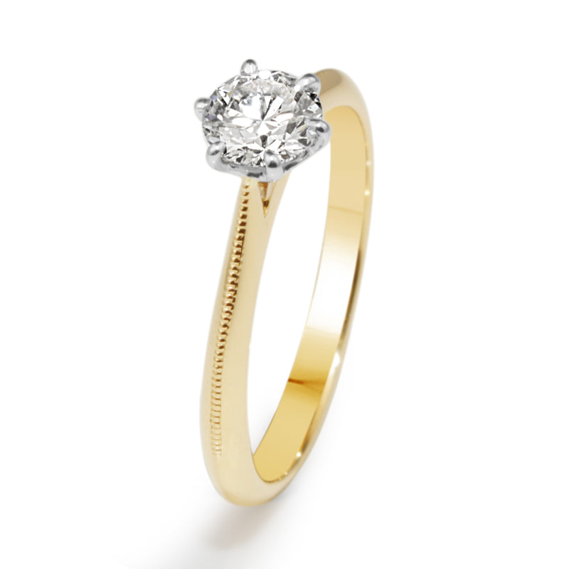 18ct Yellow and White Gold .50ct Diamond Solitaire ring