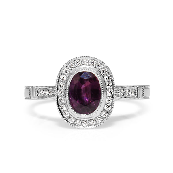 18ct White Gold Purple / Pink Sapphire and Diamond Halo Ring