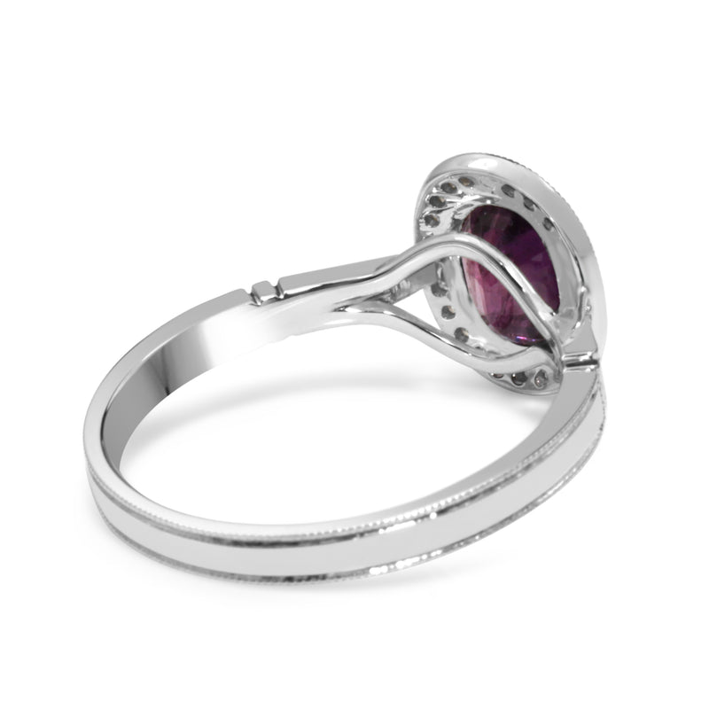 18ct White Gold Purple / Pink Sapphire and Diamond Halo Ring