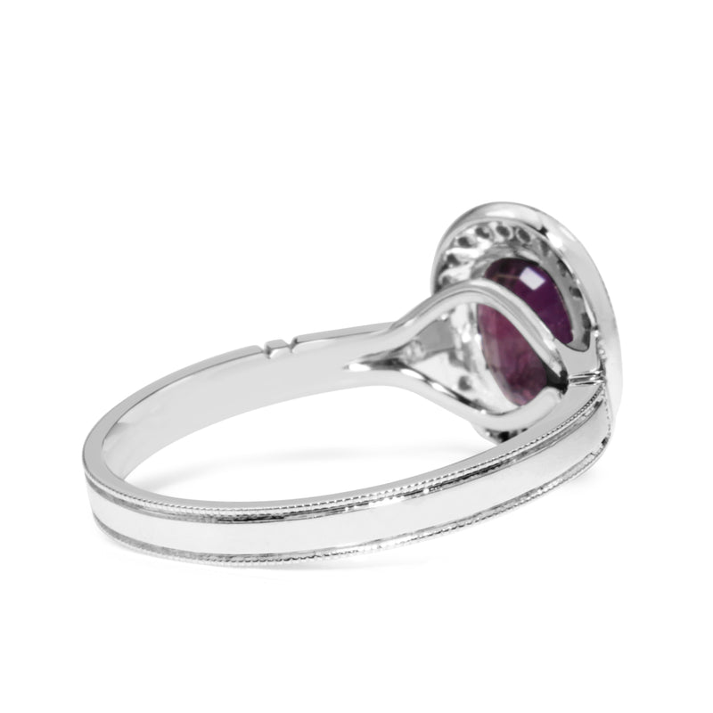 18ct White Gold Purple / Pink Sapphire and Diamond Halo Ring