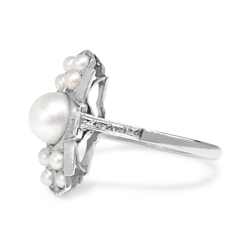 Open pearl and cz ring in platinum finish -