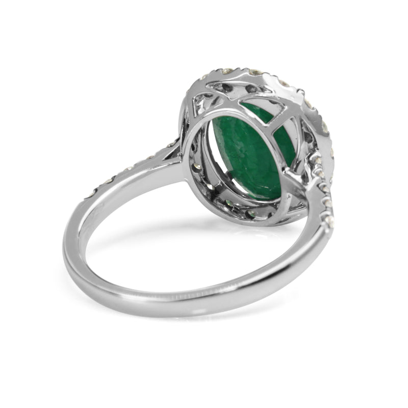 18ct White Gold Emerald and Diamond Halo Ring